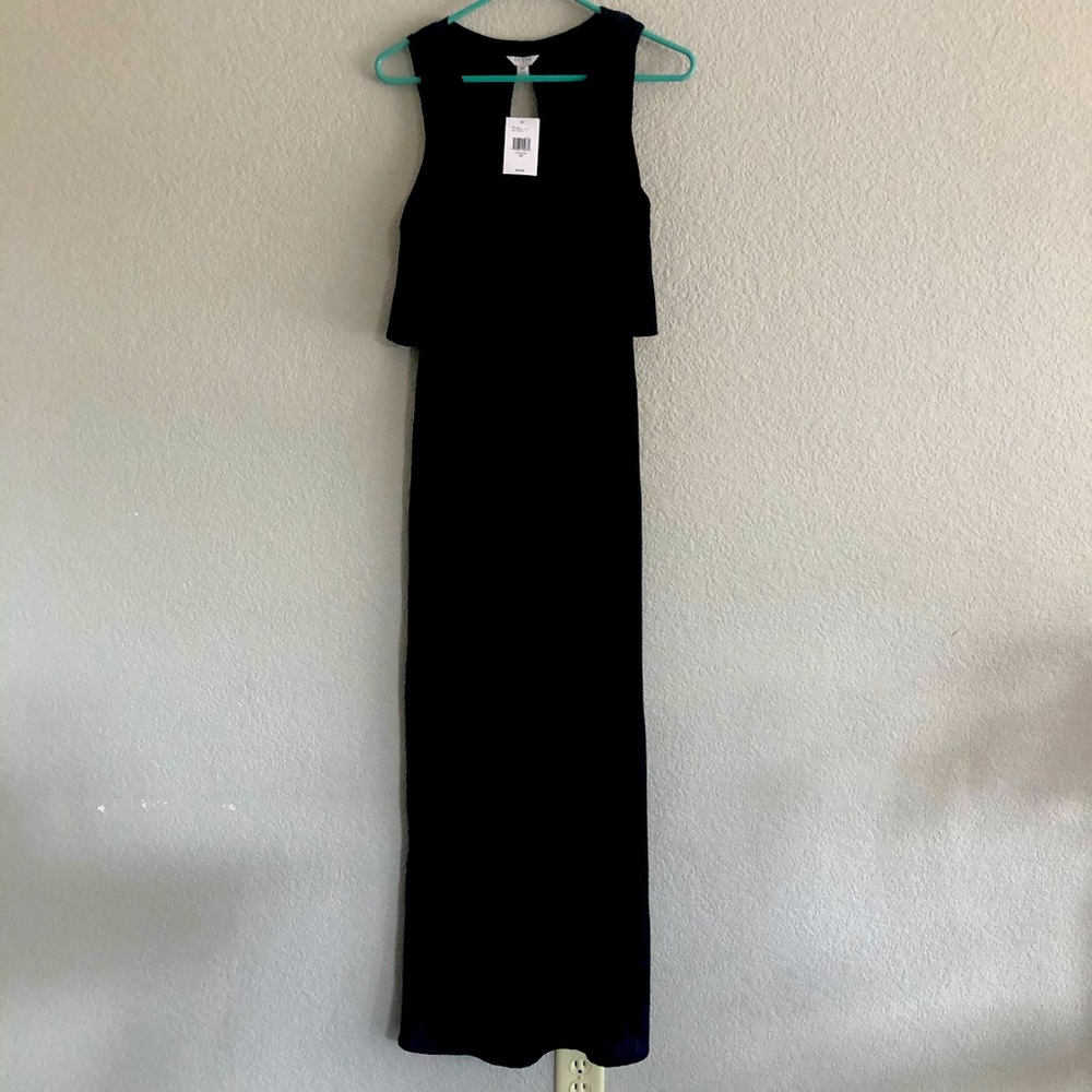 This is a Classy Guess Black Ribbed Dress - Small